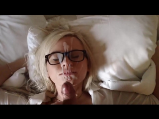 cumshot on the face of a cute blonde with glasses 18